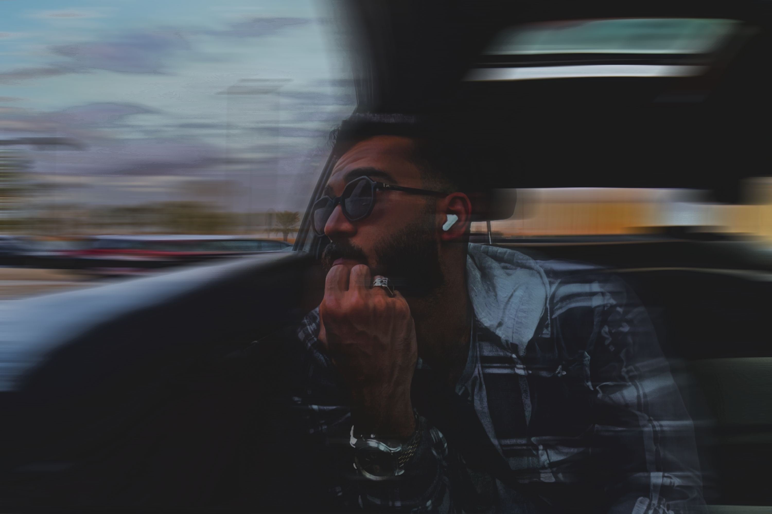 Kamal Hamad looking out of a car window